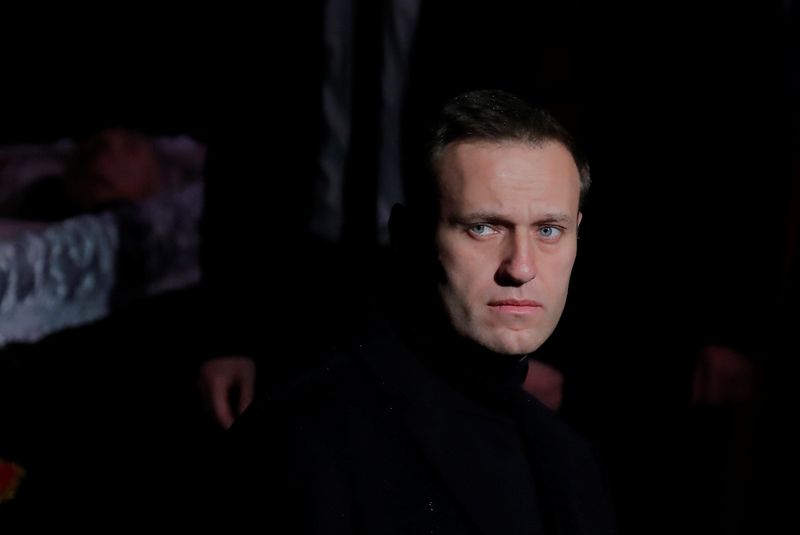&copy; Reuters. FILE PHOTO: Russian opposition leader Navalny pays respect to human rights activist Alexeyeva in Moscow