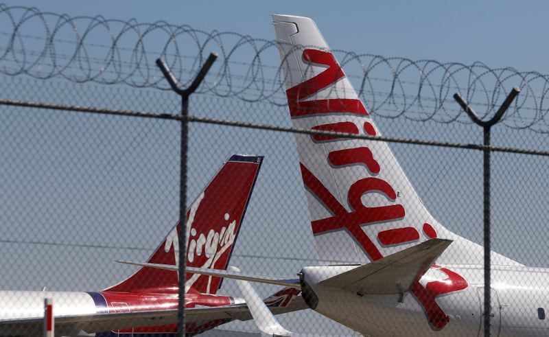 &copy; Reuters. Virgin planes are parked next to each other at Kingsford Smith airport in Sydney