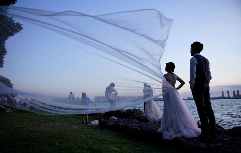 &copy; Reuters. The Wider Image: Coronavirus dampens celebrations in China&apos;s wedding gown city