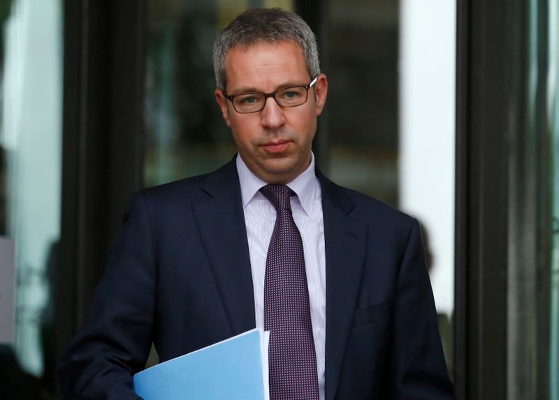 © Reuters. FILE PHOTO: AstraZeneca's head of innovative medicines Mene Pangalos leaves after appearing at a parliamentary business and enterprise committee hearing at Portcullis House in London