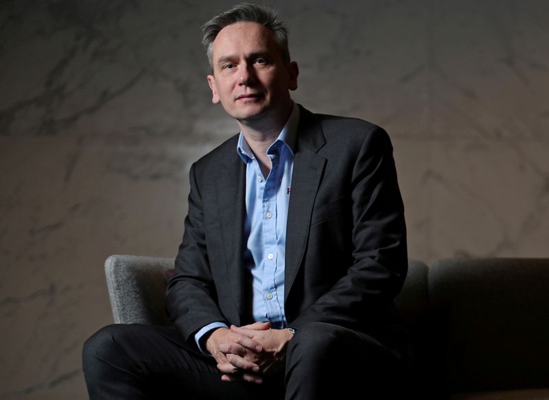 &copy; Reuters. FILE PHOTO: Jean-Sebastien Jacques, CEO of Rio Tinto Group poses for a portrait ahead of the publication of the company 2019 full year results in London