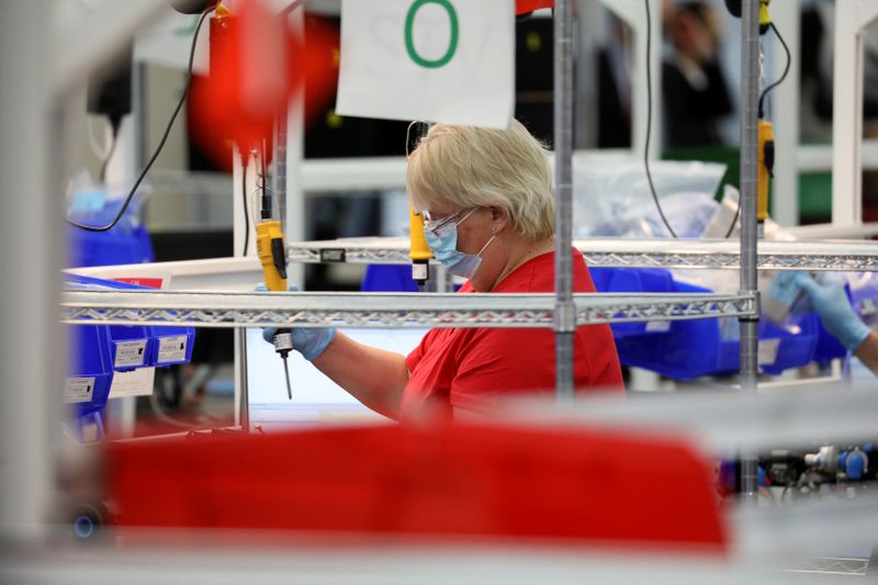 &copy; Reuters. A GM employee works to make ventilators as U.S. Vice President Mike Pence visits the General Motors Components Holding Plant, in Kokomo