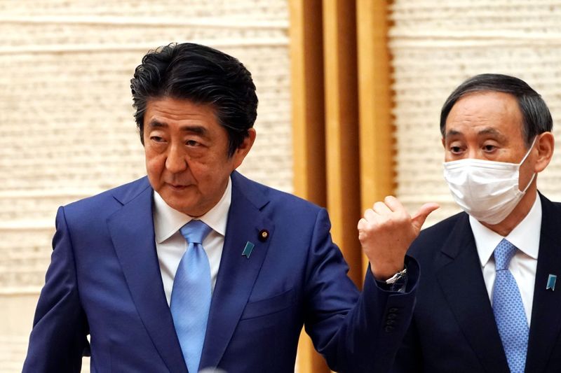 &copy; Reuters. Japan&apos;s Prime Minister Shinzo Abe speaks during a news conference regarding the coronavirus disease (COVID-19) spread, in Tokyo