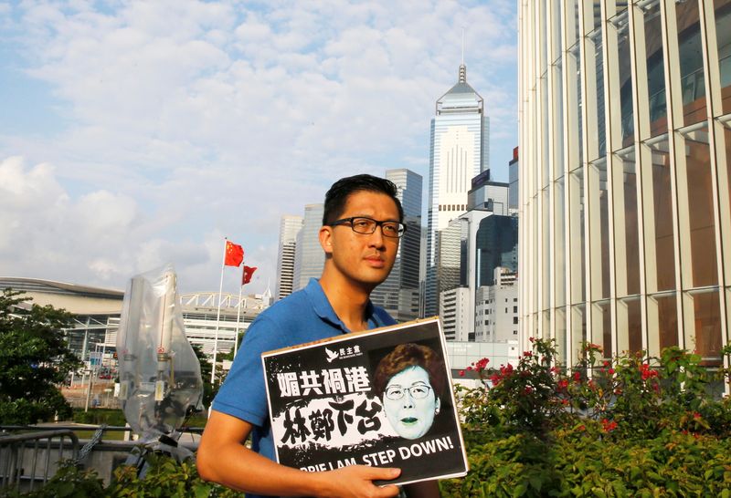 &copy; Reuters. Member of Hong Kong&apos;s Democratic Party Lam Cheuk-ting arrives at a news conference in response to the announcement by Hong Kong Chief Executive Carrie Lam regarding the proposed extradition bill, outside the Legislative Council building in Hong Kong