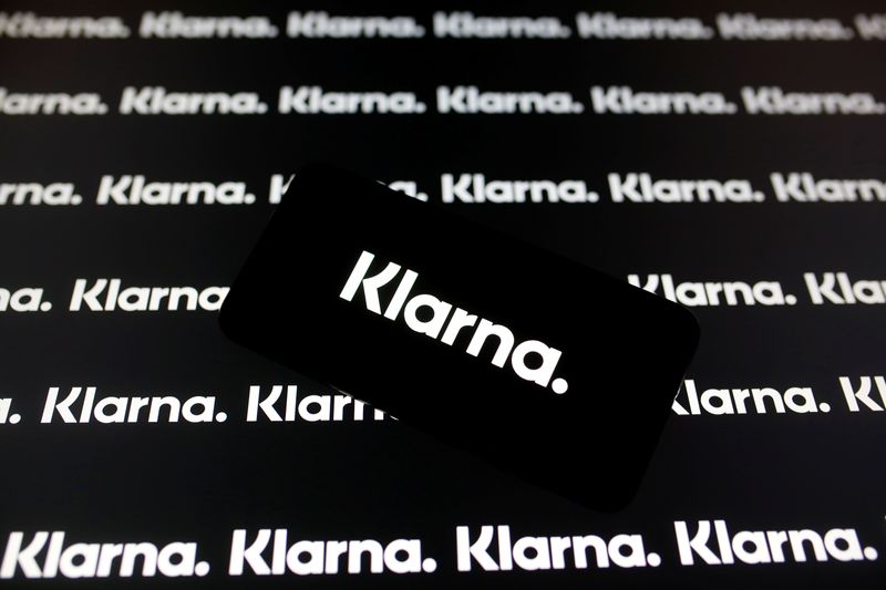 &copy; Reuters. A smartphone displays a Klarna logo in this illustration