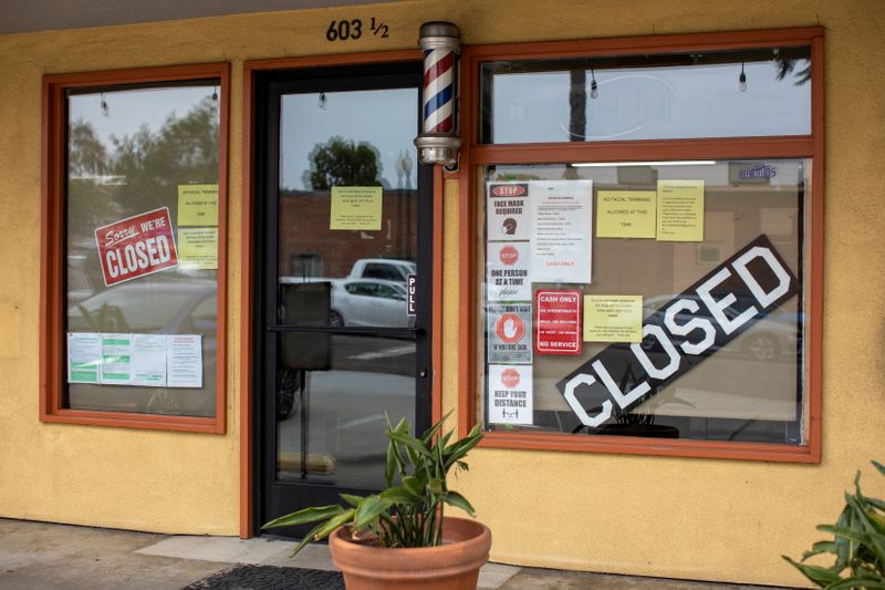 &copy; Reuters. FILE PHOTO: A closed barber shop is shown during the outbreak of the coronavirus disease in California