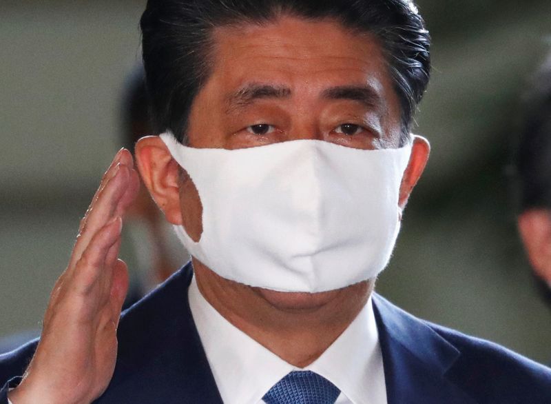 &copy; Reuters. 来年前半まで全国民分のワクチン確保目指す＝コロナ対策で安倍首相