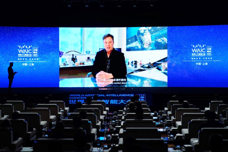 &copy; Reuters. Tesla Inc CEO Elon Musk is seen on a screen during the opening ceremony of the WAIC in Shanghai
