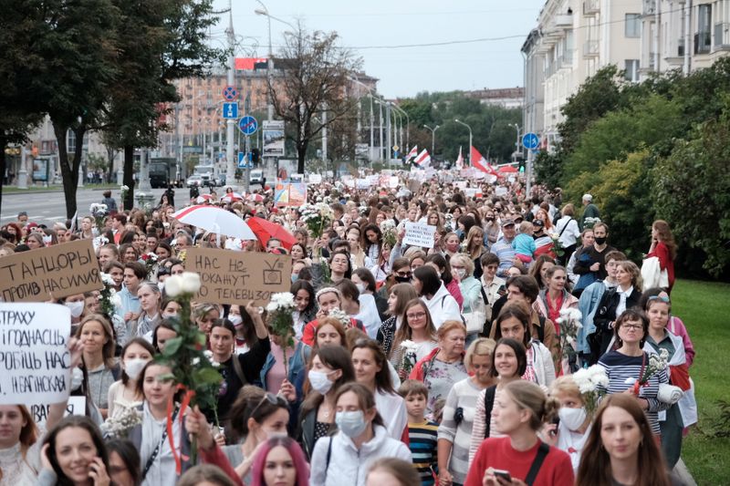 &copy; Reuters. Women attend a demonstration against police brutality following recent protests to reject the presidential election results in Minsk