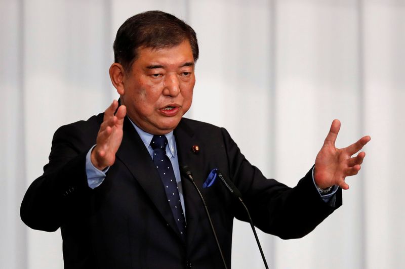 &copy; Reuters. Japan&apos;s ex-defence minister Shigeru Ishiba delivers a speech during a meeting on the LDP party leader election at the party&apos;s headquarters in Tokyo