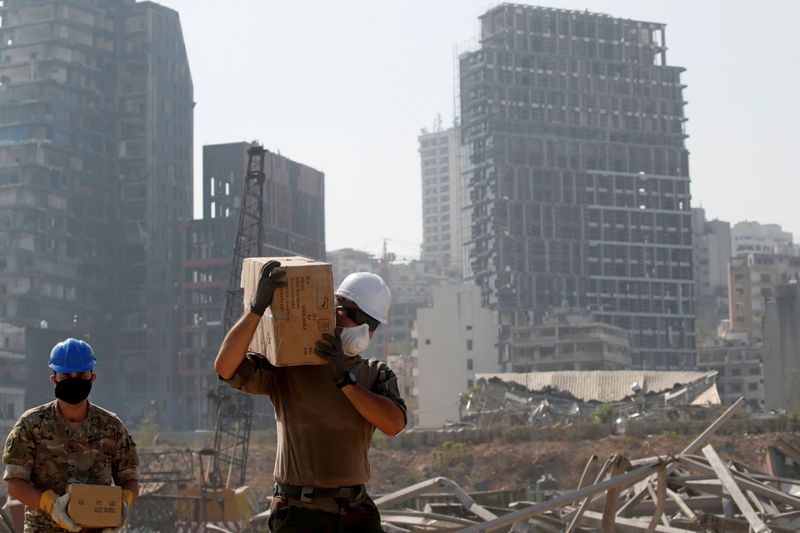 &copy; Reuters. FILE PHOTO: A member of the French military works at the damaged site of the massive blast in Beirut&apos;s port area, in Beirut