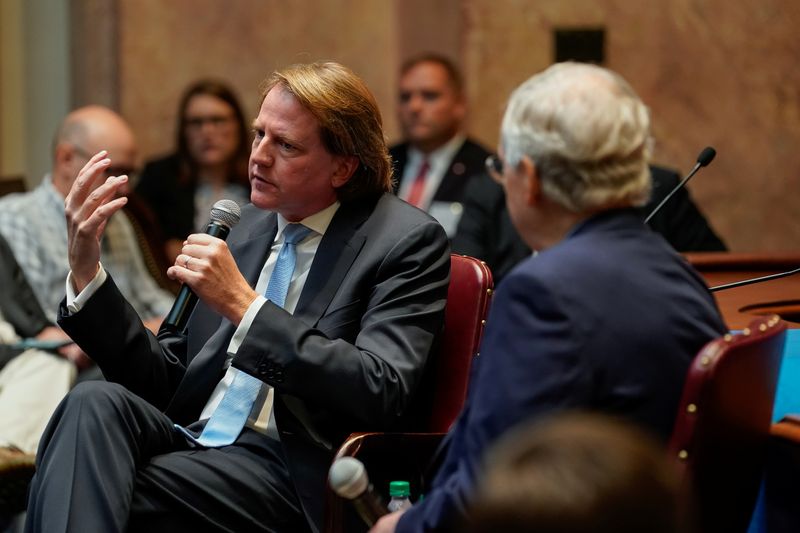 &copy; Reuters. Former White House counsel Don McGahn sits with Senate Majority Leader Mitch McConnell while speaking to a gathering of the Federalist Society at the State Capitol in Frankfort