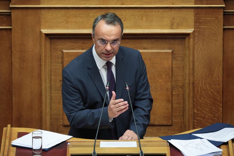 &copy; Reuters. Greek Finance Minister Christos Staikouras addresses lawmakers during a parliamentary session before a budget vote in Athens