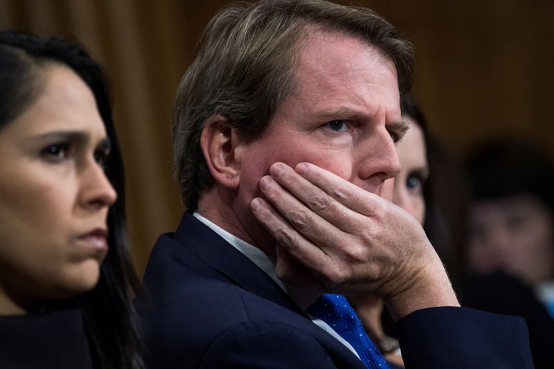 © Reuters. FILE PHOTO: White House counsel Don McGahn  listens to Christine Blasey Ford testify during the Senate Judiciary Committee hearing on the nomination of Brett M. Kavanaugh