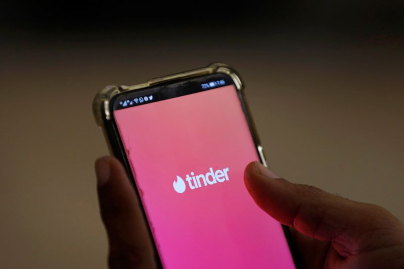 © Reuters. The dating app Tinder is shown on a mobile phone in this picture illustration