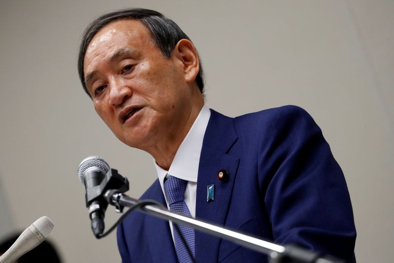 &copy; Reuters. Yoshihide Suga, Japan&apos;s Chief Cabinet Secretary attends a news conference, in Tokyo