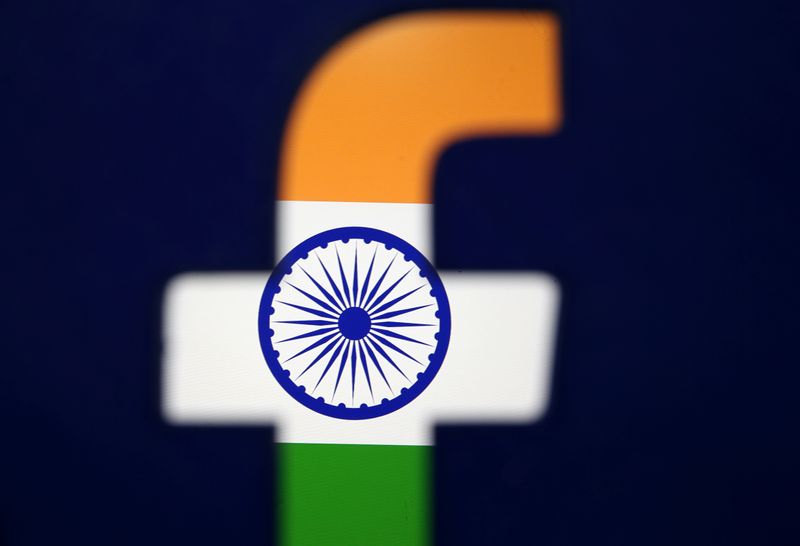 &copy; Reuters. India&apos;s flag is seen through a 3D printed Facebook logo in this illustration picture