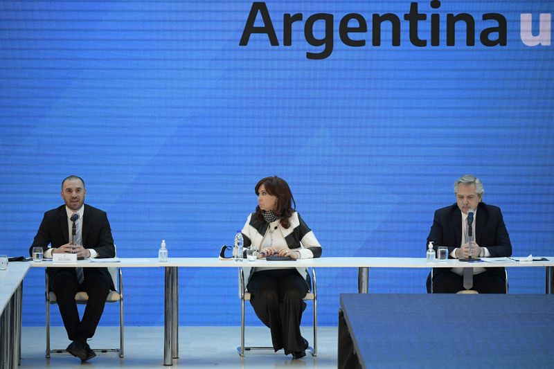 &copy; Reuters. Argentina&apos;s President Alberto Fernandez, Vice President Cristina Fernandez de Kirchner and Economy Minister Martin Guzman attend a news conference, at the Casa Rosada Presidential Palace, in Buenos Aires