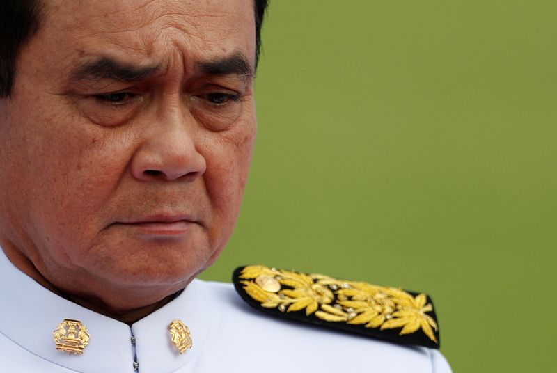 &copy; Reuters. FILE PHOTO: Thailand&apos;s Prime Minister Prayuth Chan-ocha attends a family photo session with new cabinet ministers at the Government House in Bangkok