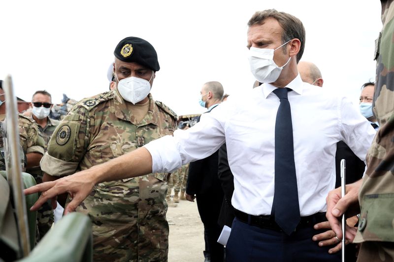 &copy; Reuters. FILE PHOTO: French President Macron visits the port area of Beirut
