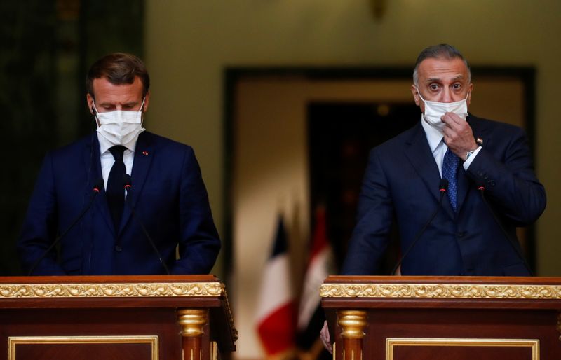 © Reuters. ماكرون يؤكد دعم فرنسا لسيادة العراق خلال زيارته بغداد