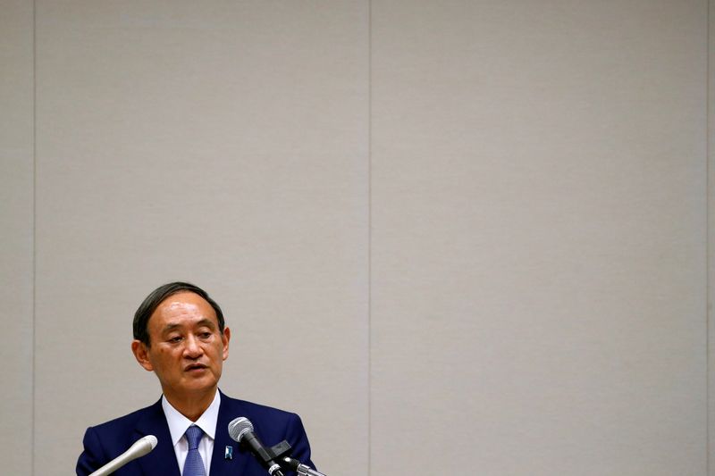 &copy; Reuters. Yoshihide Suga, Japan&apos;s Chief Cabinet Secretary attends a news conference, in Tokyo