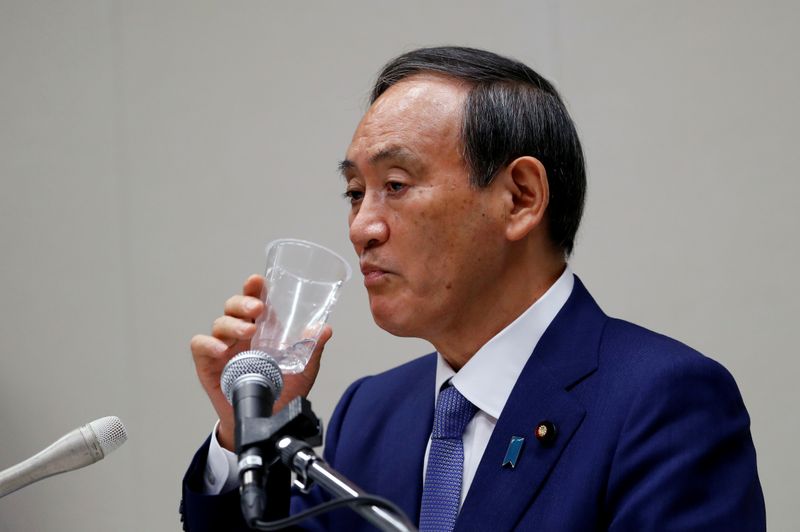&copy; Reuters. FILE PHOTO: Yoshihide Suga, Japan&apos;s Chief Cabinet Secretary attends a news conference, in Tokyo