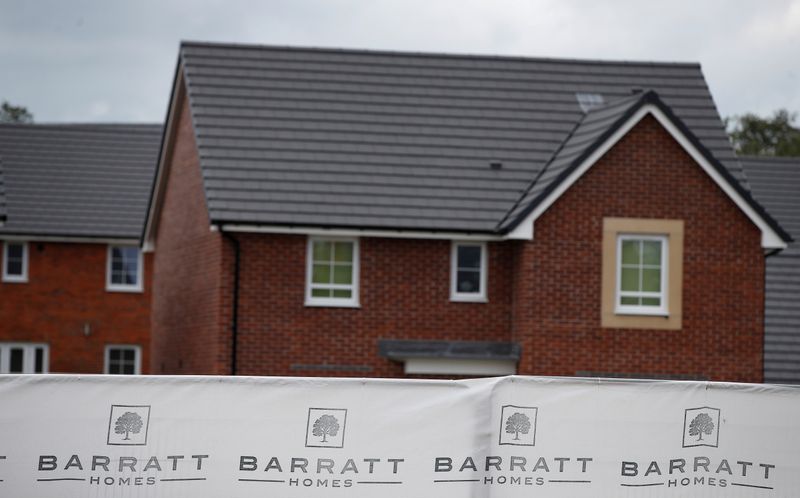 © Reuters. FILE PHOTO: Branding is seen on a new Barratt Homes housing development near Warrington, Britain