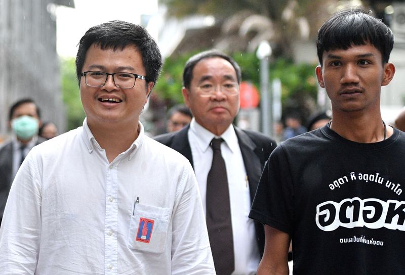 &copy; Reuters. FILE PHOTO: Anon Nampa and Panupong Jadnok, two of the leaders of recent anti-government protests, are seen after being granted a bail outside the criminal court in Bangkok