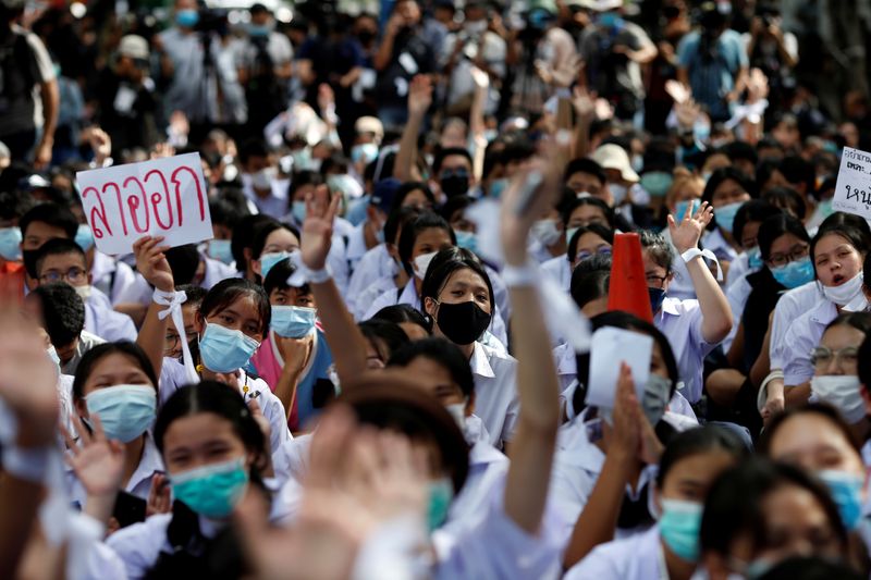 &copy; Reuters. Anti-government protesters and students attend a demonstration in Bangkok