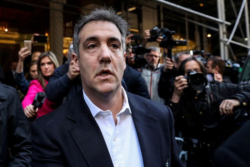 &copy; Reuters. FILE PHOTO: Michael Cohen, a former lawyer for U.S. President Donald Trump leaves his apartment to report to prison in New York