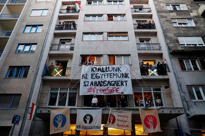 &copy; Reuters. People attend a protest in support of the students of the University of Theatre and Film Arts during their blockade in Budapest