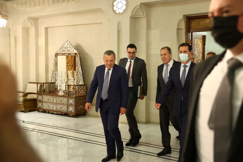 &copy; Reuters. Russian Deputy Prime Minister Yuri Borisov and Foreign Minister Sergei Lavrov attend a meeting with Syrian President Bashar al-Assad in Damascus