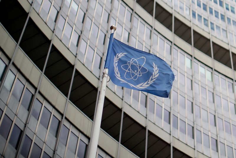 &copy; Reuters. FILE PHOTO: A flag with the logo of the International Atomic Energy Agency flutters in front of their headquarters in Vienna