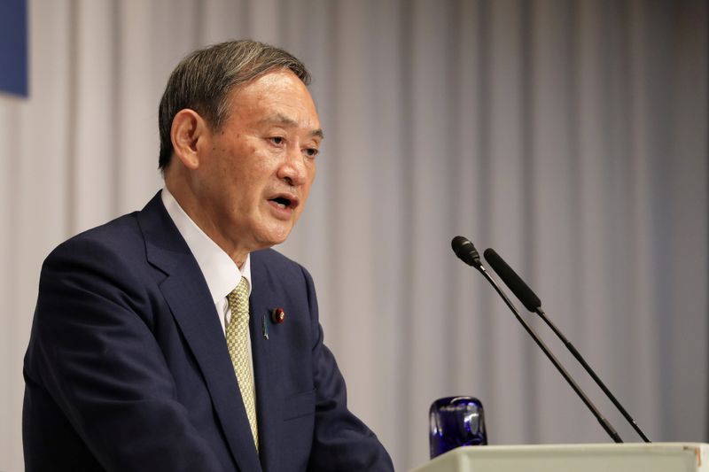 &copy; Reuters. Japanese Chief Cabinet Secretary Yoshihide Suga , former Foreign Minister Fumio Kishida and former Defence Minister Shigeru Ishiba attend a speech session for the LDP leadership election in Tokyo