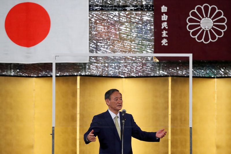 &copy; Reuters. Japan&apos;s Chief Cabinet Secretary Yoshihide Suga speaks as he officially kicks off his campaign rally for ruling Liberal Democratic Party&apos;s (LDP) presidential election in Tokyo