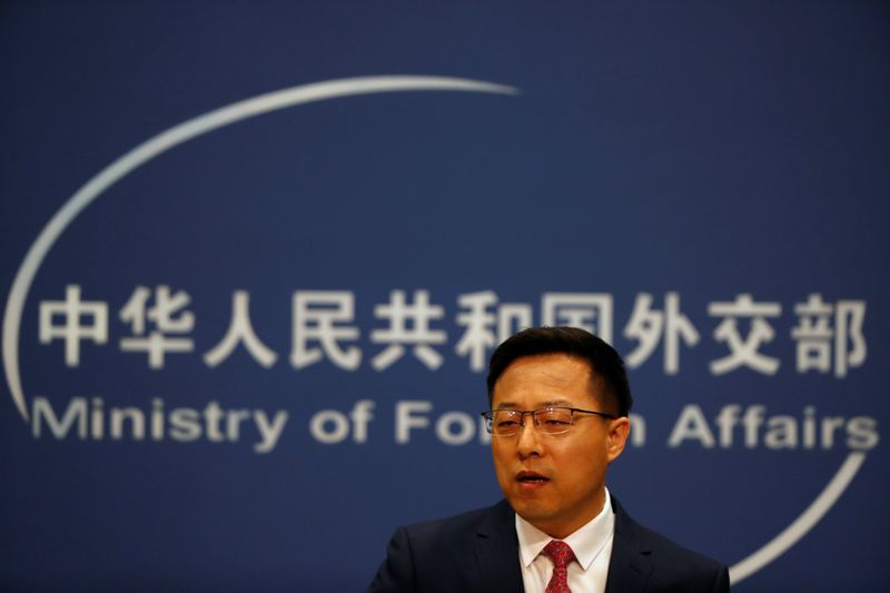 © Reuters. Chinese Foreign Ministry spokesman Zhao Lijian attends a news conference in Beijing