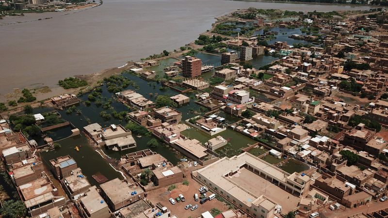 &copy; Reuters. An aerial view shows buildings and roads submerged by floodwaters near the Nile River in South Khartoum