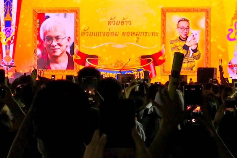 &copy; Reuters. A still image from a video shows images of Somsak and Pavin at a demonstration in Bangkok