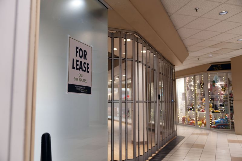 &copy; Reuters. A view of a sign in the shop window at Confederation Court Mall, in Charlottetown