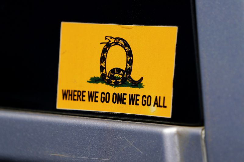 © Reuters. FILE PHOTO: A sticker that references the QAnon slogan is seen on a truck that participated in a caravan convoy in Adairsville