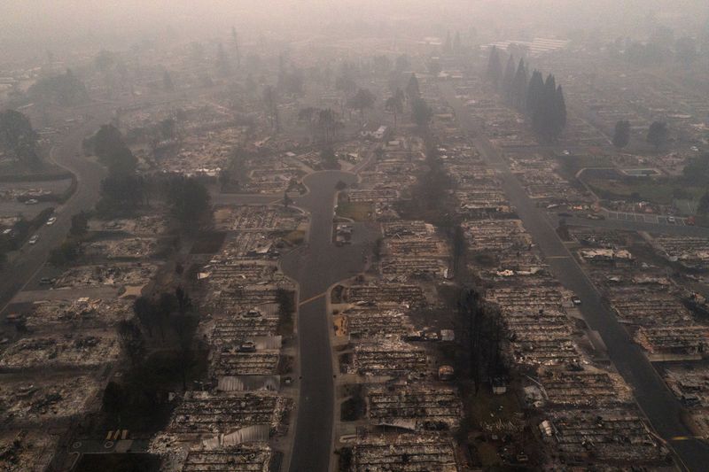 'Everything is gone': wildfires torch hundreds of homes in U.S. West