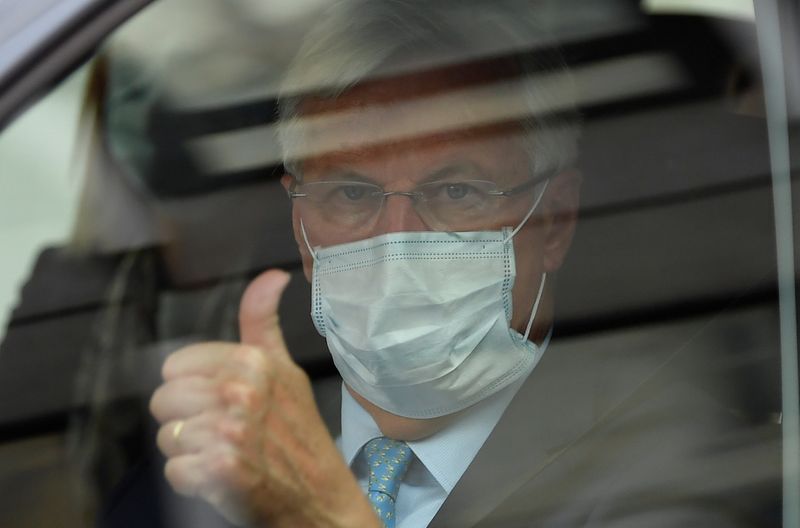 © Reuters. EU's Chief Negotiator Michel Barnier gestures inside a vehicle in Westminster
