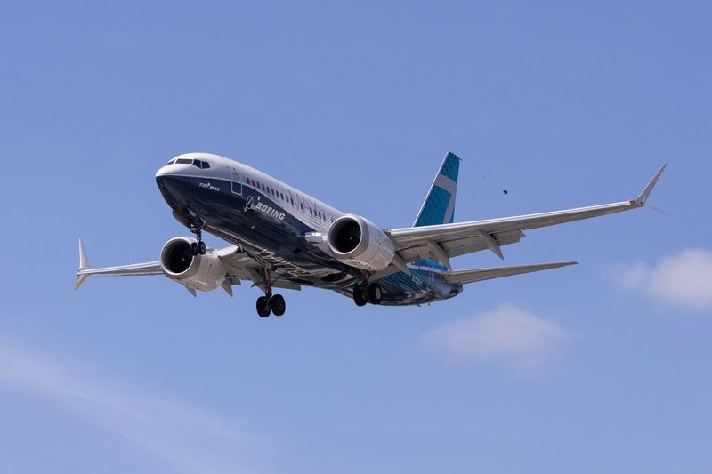 &copy; Reuters. FILE PHOTO: A Boeing 737 MAX airplane lands after a test flight at Boeing Field in Seattle