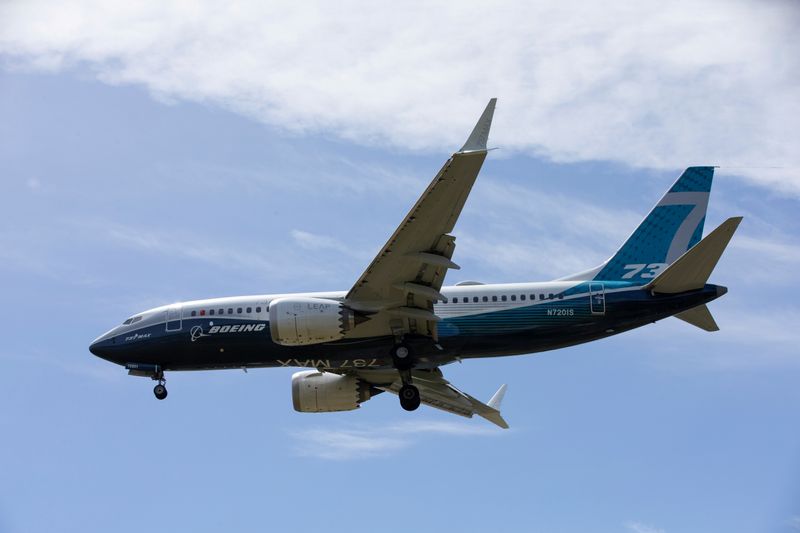 &copy; Reuters. FILE PHOTO: A Boeing 737 MAX airplane lands after a test flight at Boeing Field in Seattle