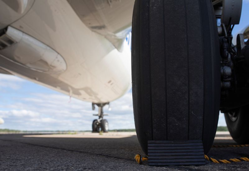 &copy; Reuters. Rubber wheel chocks are seen behind the tires on an A310 airplane on the tarmac at Aerocycle in Mirabel