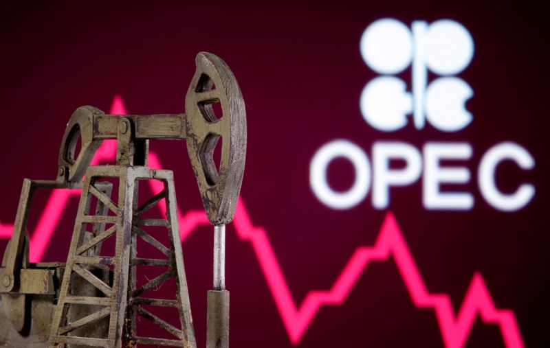 © Reuters. FILE PHOTO: A 3D printed oil pump jack is seen in front of displayed stock graph and Opec logo in this illustration picture