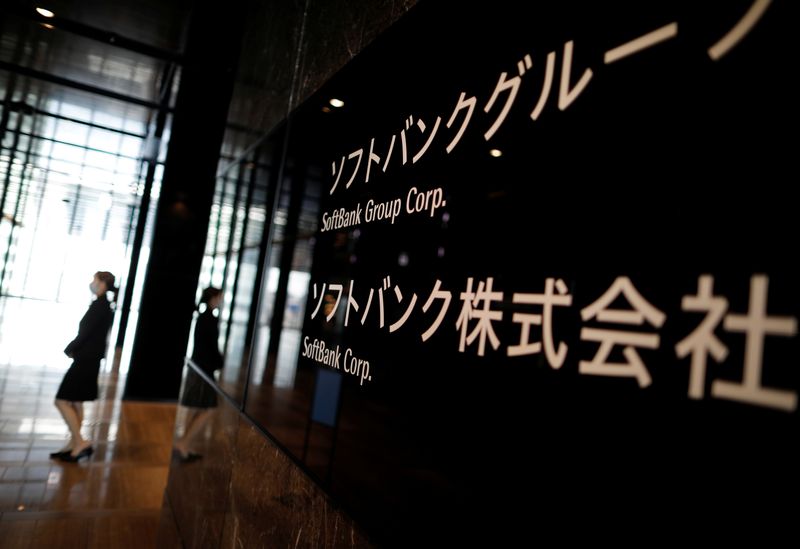 &copy; Reuters. The signs of SoftBank Group Corp. and SoftBank Corp. are displayed at their new headquarters building during a press preview in Tokyo