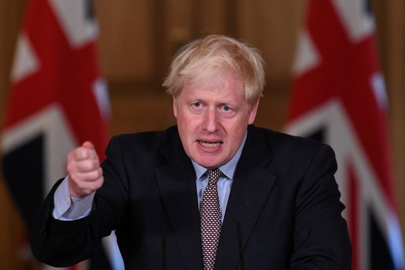 &copy; Reuters. FILE PHOTO: Britain&apos;s Prime Minister Boris Johnson holds a virtual news conference, in London