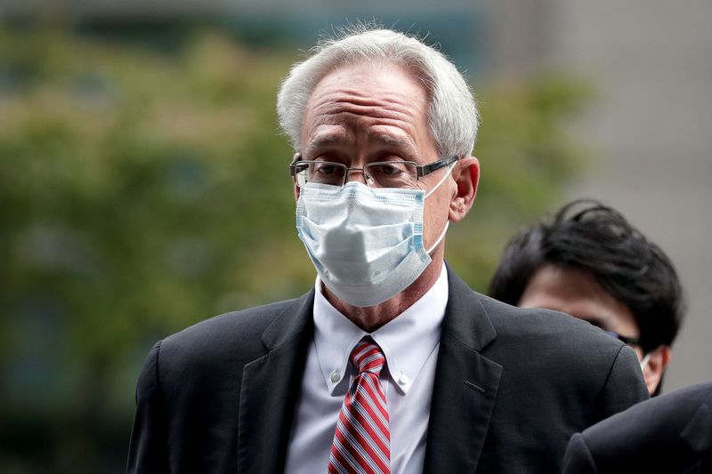 &copy; Reuters. Greg Kelly, former representative director of Nissan Motor Co., arrives for the first trial hearing at the Tokyo District Court in Tokyo